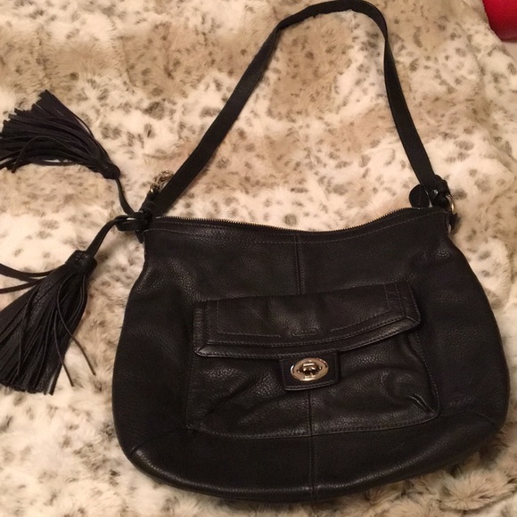 Leather coach bag with tassel accent. Zips closed - Picture 1 of 3